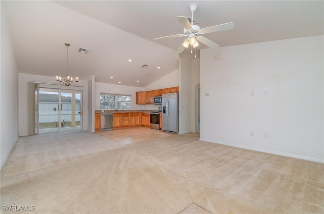 unfurnished living room featuring light carpet, high vaulted ceiling, and ceiling fan with notable chandelier