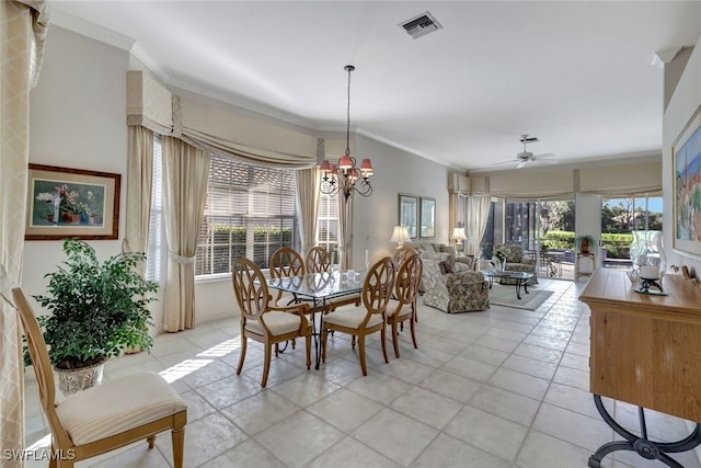 dining room with crown molding, light tile patterned floors, and ceiling fan with notable chandelier