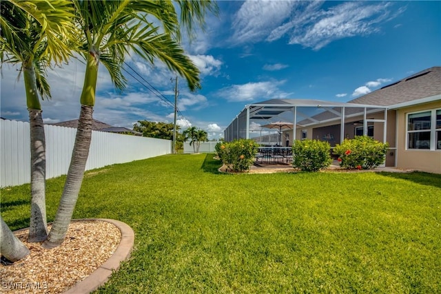 view of yard featuring a lanai