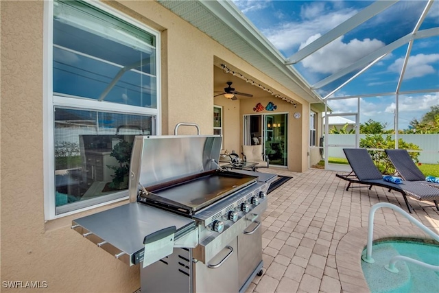 view of patio / terrace featuring a lanai