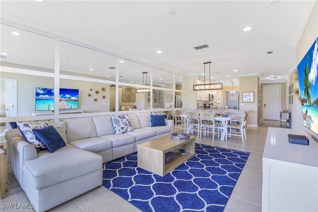 tiled living room featuring crown molding