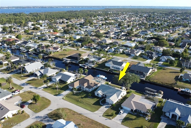 drone / aerial view featuring a water view