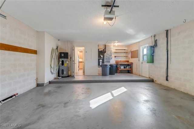 garage featuring a garage door opener and heat pump water heater