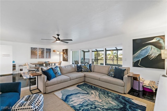 living room with ceiling fan