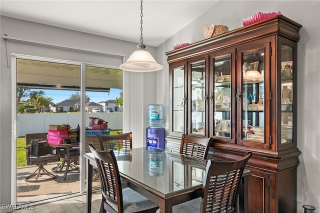 dining space with light hardwood / wood-style flooring