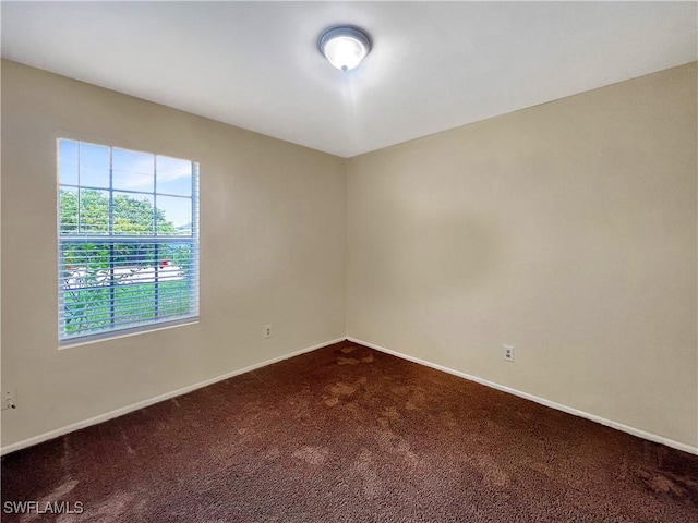 view of carpeted spare room