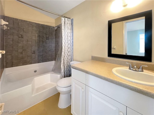 full bathroom with shower / bath combination with curtain, tile patterned floors, vanity, vaulted ceiling, and toilet