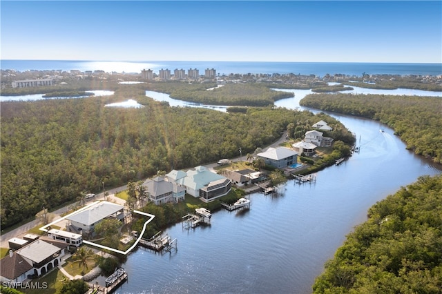 birds eye view of property featuring a water view