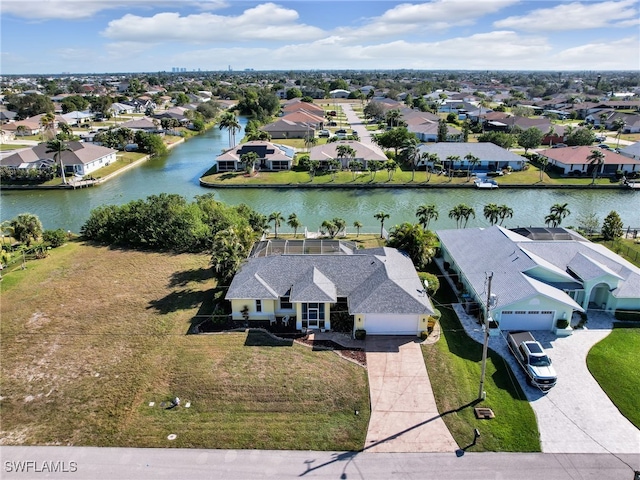 drone / aerial view featuring a water view