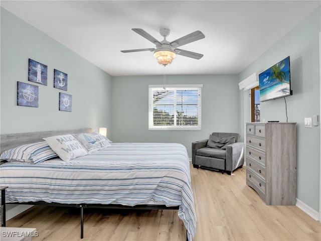 bedroom featuring ceiling fan and light hardwood / wood-style floors