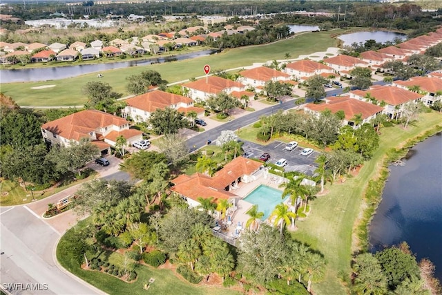 drone / aerial view featuring a water view