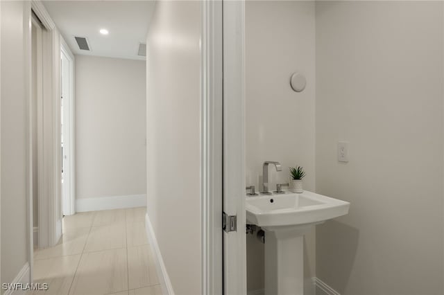 bathroom with tile patterned flooring