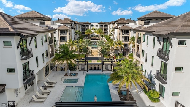 view of pool featuring a patio area