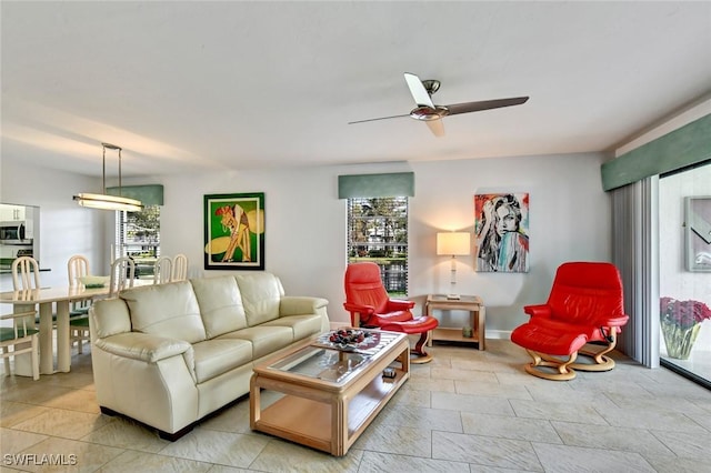 living room with ceiling fan