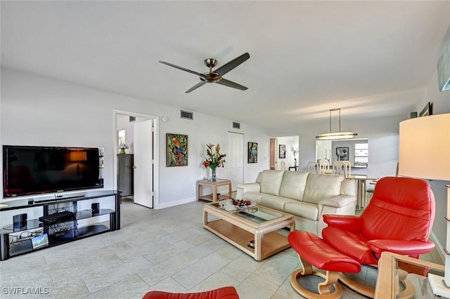 living room featuring ceiling fan