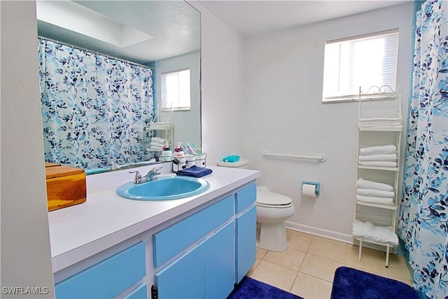 bathroom with tile patterned floors, vanity, toilet, and a shower with shower curtain