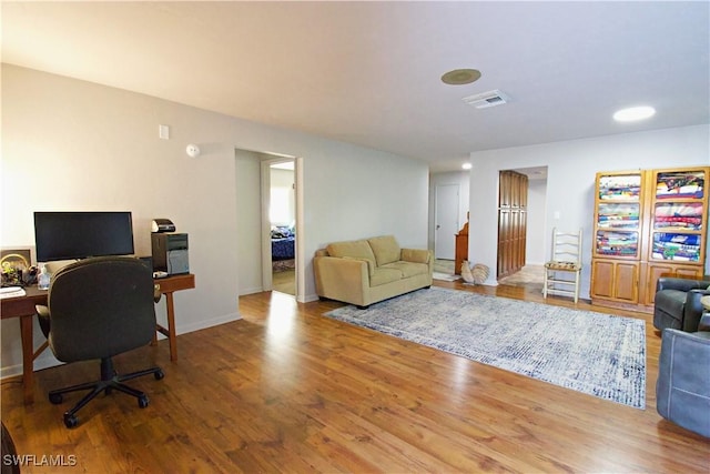 office space featuring hardwood / wood-style floors