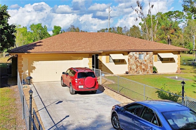 ranch-style home with a front yard and a garage