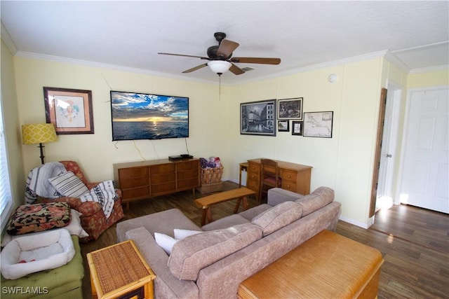 living room with crown molding, ceiling fan, and dark hardwood / wood-style floors