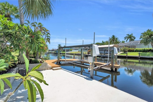 view of dock with a water view