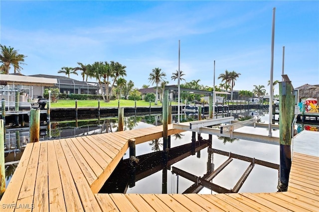 view of dock with a water view