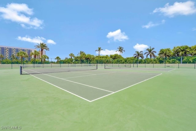 view of tennis court featuring basketball court