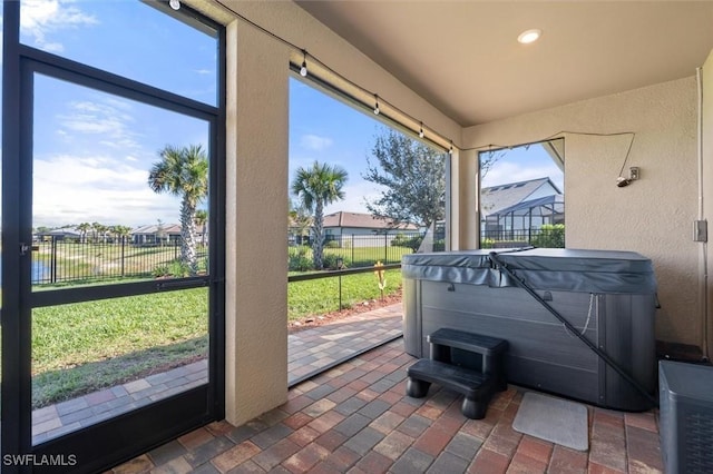 sunroom featuring a wealth of natural light