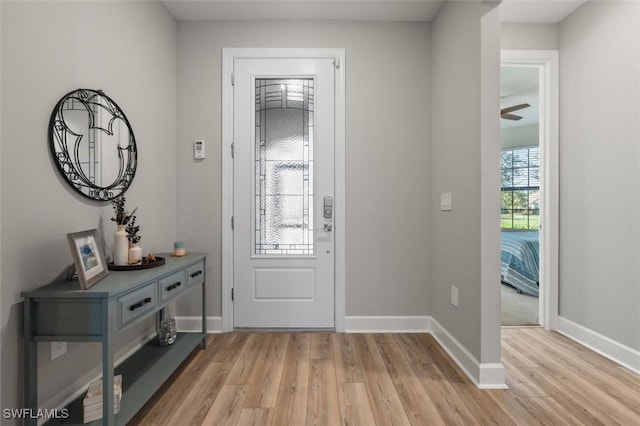 foyer with light wood-type flooring