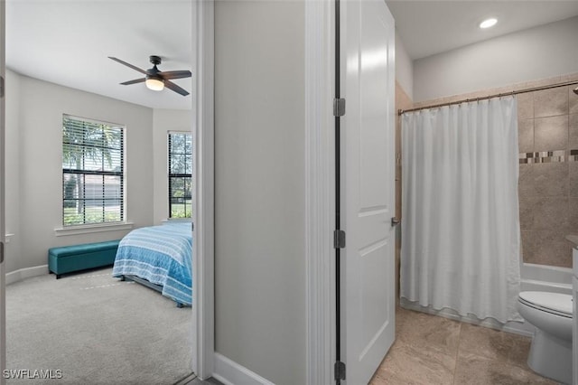 full bathroom featuring baseboards, toilet, ceiling fan, shower / bathtub combination with curtain, and recessed lighting