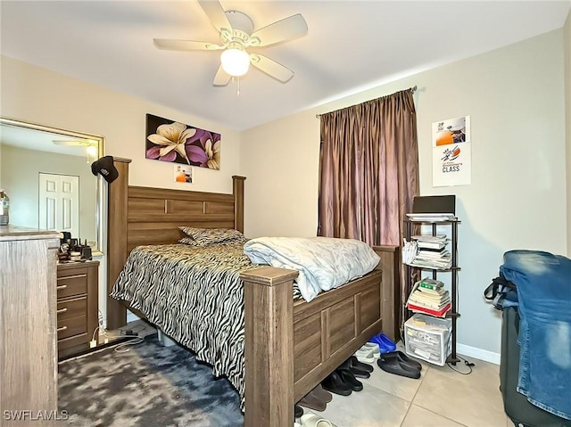 tiled bedroom with ceiling fan