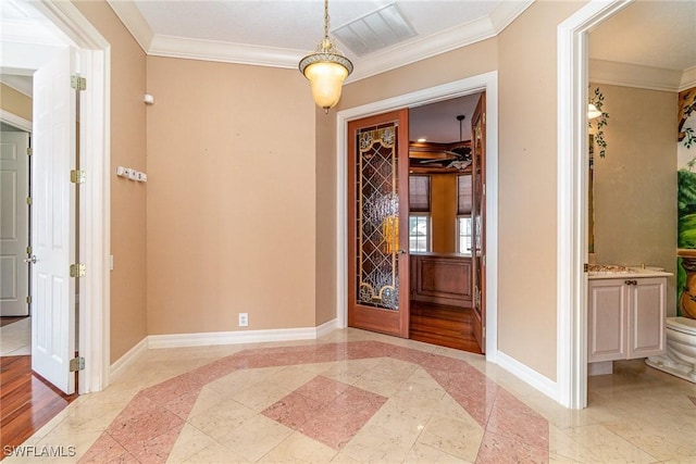 interior space featuring ornamental molding