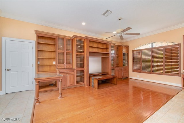 living room featuring ceiling fan, light wood-type flooring, and ornamental molding