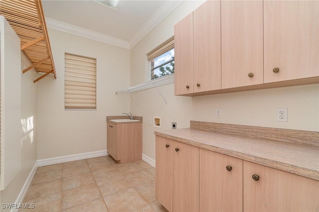 washroom with hookup for an electric dryer, cabinets, crown molding, and washer hookup