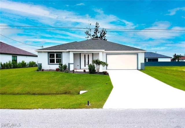 ranch-style home featuring a garage and a front lawn