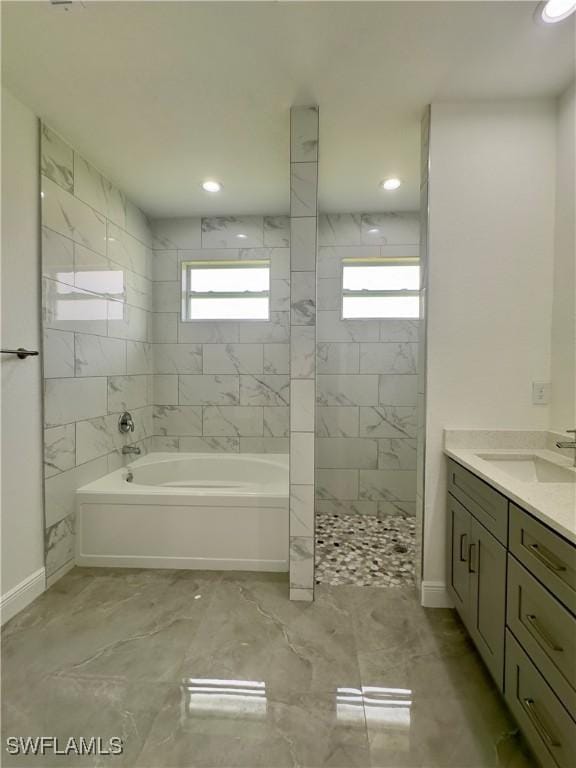 bathroom with separate shower and tub and vanity