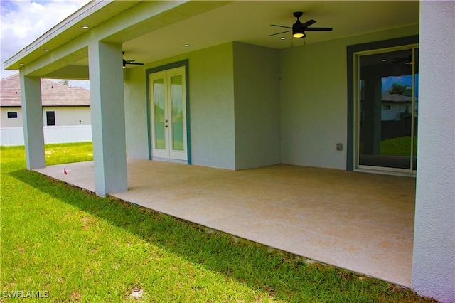 view of patio / terrace featuring ceiling fan and french doors