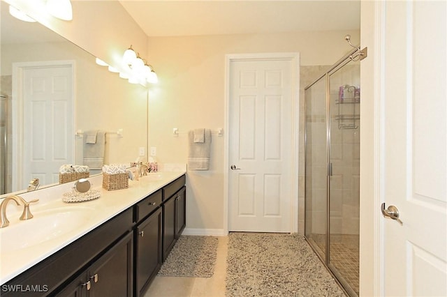 bathroom with vanity and walk in shower