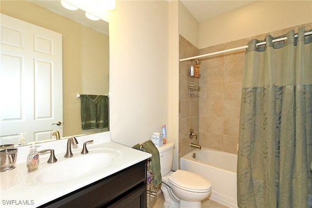 full bathroom featuring vanity, toilet, and shower / tub combo with curtain