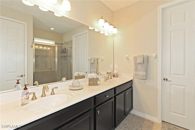 bathroom with vanity and an enclosed shower