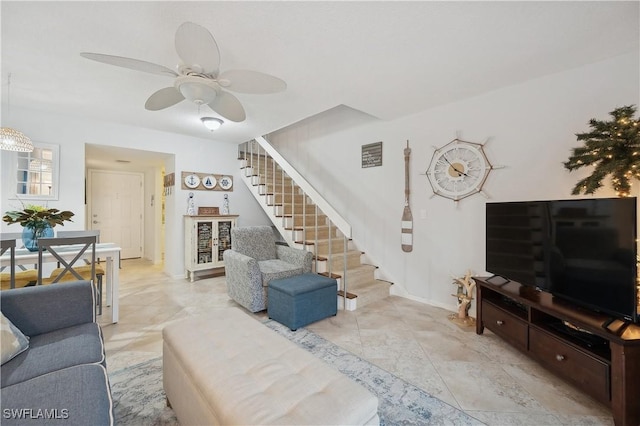 living room featuring ceiling fan