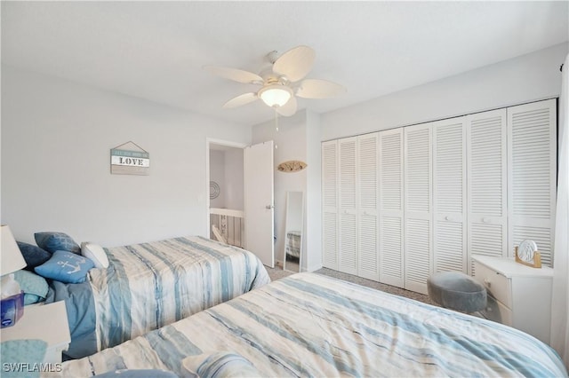 bedroom featuring carpet, a closet, and ceiling fan