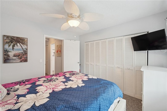 bedroom with carpet flooring, ceiling fan, and a closet