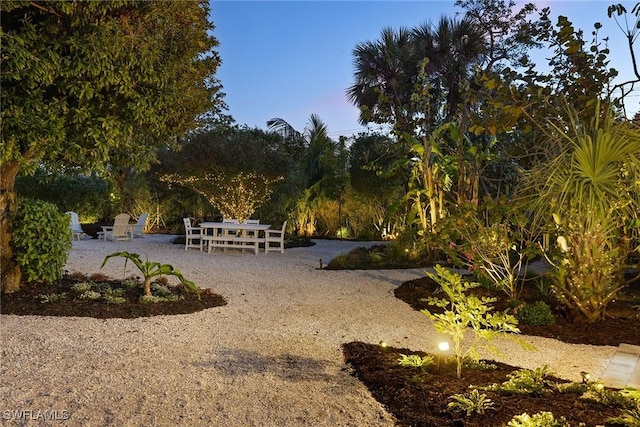 surrounding community featuring a patio area