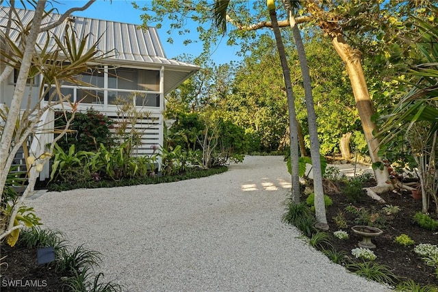 exterior space with a sunroom