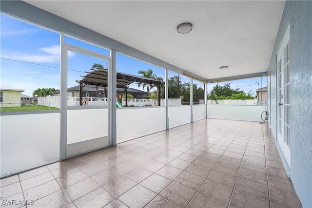 view of unfurnished sunroom