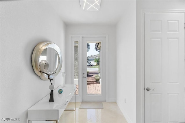 entrance foyer featuring light tile patterned flooring