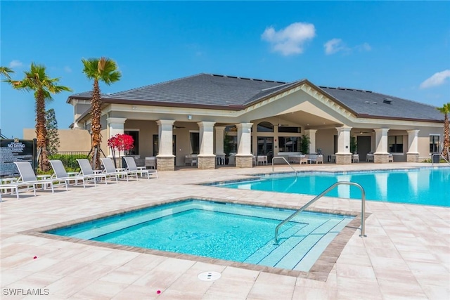 view of swimming pool with a patio area