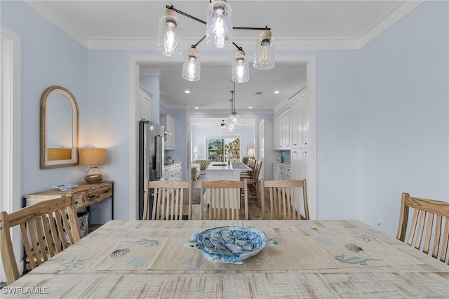 dining area with crown molding