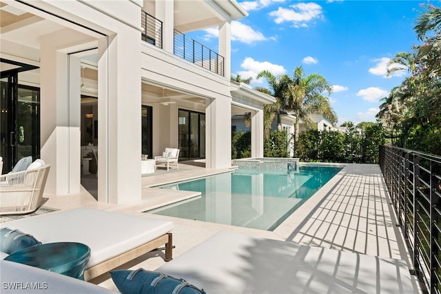 view of swimming pool with a patio area