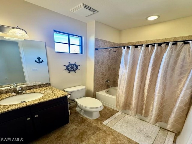 full bathroom featuring tile patterned floors, toilet, vanity, and shower / bathtub combination with curtain